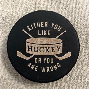 Hockey puck bottle opener